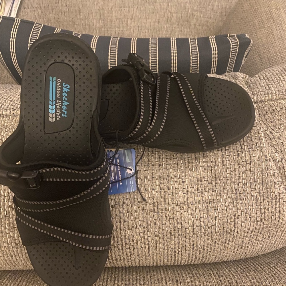 Sketcher sandals brand new.